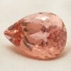 Natural imperial topaz gemstone, pear cut front view