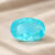Natural Paraiba Tourmaline oval cut turquoise blue gemstone on ivory fabric