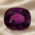 Natural Deep Purple cushion cut gemstone on ivory fabric