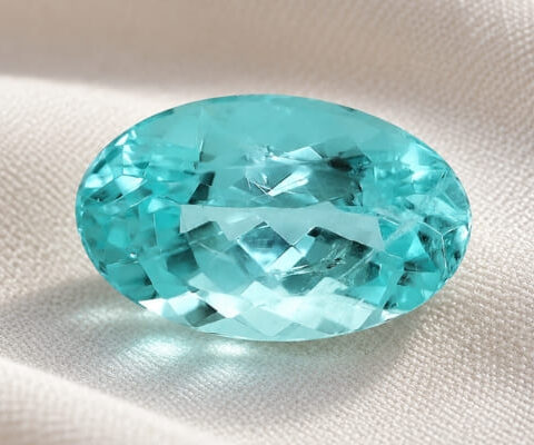 Natural Mozambique Green Blue Tourmaline oval cut gemstone front view