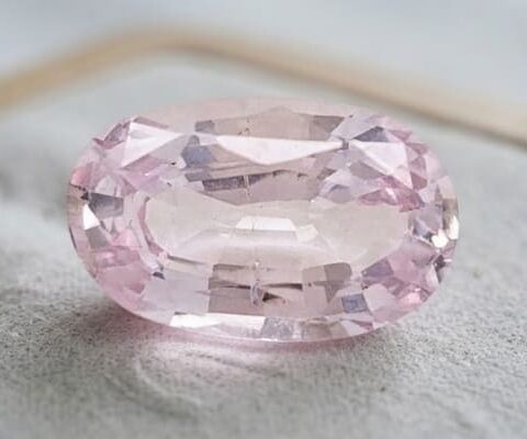 Natural oval peach sapphire gemstone top view