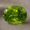 Natural oval peridot gemstone top view