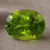 Natural oval peridot gemstone top view