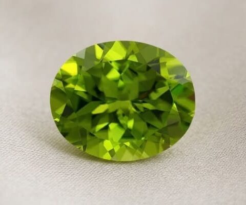 Natural oval peridot gemstone top view