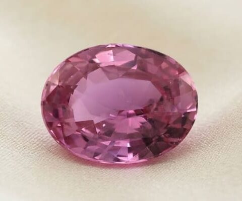Natural oval pink sapphire gemstone top view