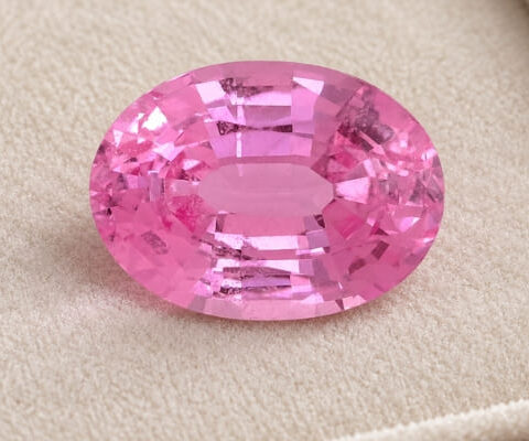 Natural oval pink sapphire gemstone top view