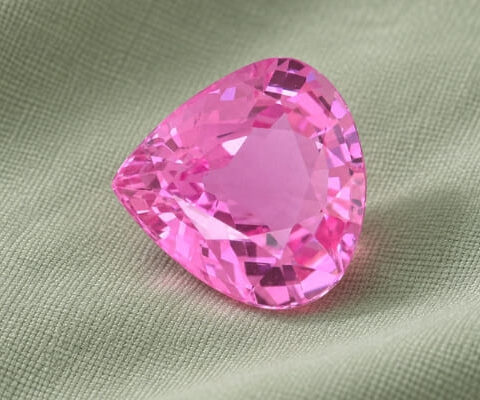Natural trillion cut pink sapphire gemstone top view
