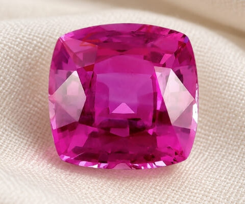 Natural cushion cut pink sapphire gemstone top view