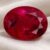 Natural Rubellite Tourmaline gemstone with vivid raspberry-red color and oval cut, front view.