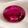 Natural Rubellite Tourmaline gemstone with vivid raspberry-pink color and oval cut, front view.