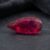 Natural Rubellite Tourmaline gemstone with rich raspberry-red color and pear cut, angled view.