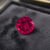 Natural Rubellite Tourmaline gemstone with vivid raspberry-pink color and round cut, front view.