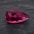 Natural Rubellite Tourmaline gemstone with vibrant raspberry-pink color and pear cut, front view.