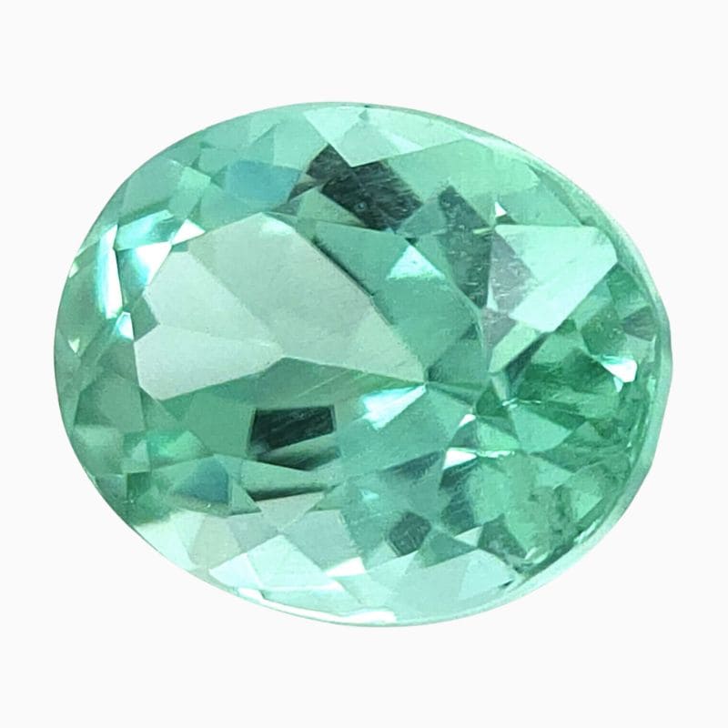 Natural sea-foam green oval tourmaline gemstone