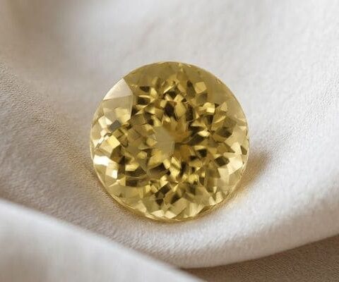 Natural Golden Yellow Sinhalite Round Cut Gemstone Front View