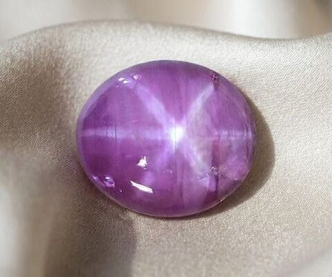 Natural Purple Star Sapphire Oval Cabochon Front View
