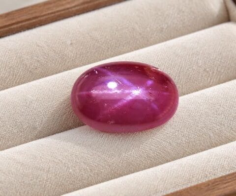 Natural Pink Star Ruby Oval Cabochon Close-Up View