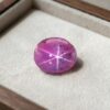 Natural Pink Star Ruby Oval Cabochon Front View