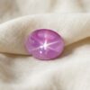 Natural Pink Star Ruby Oval Cabochon Front View