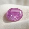 Natural Pink Star Ruby Oval Cabochon Front View