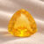 Heated Triangular Orangy Yellow Sapphire