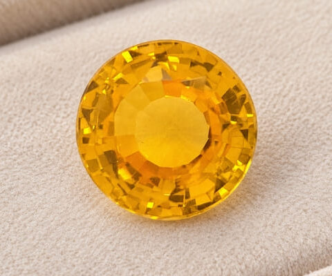 Heated Round Orangy Yellow Sapphire